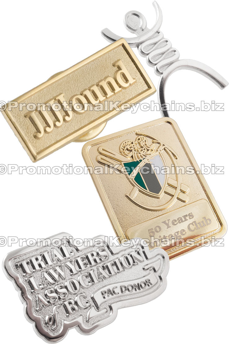 Group of Polished + Matte Boulevard Series lapel pins showing different colors of gold and silver nickel. Also custom shaped pins and rectangle pins shown. 