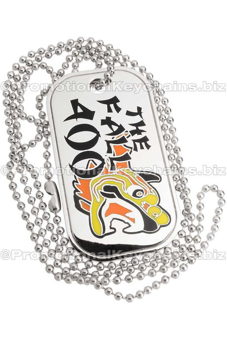Example of custom die cast dog tag with polished silver metal. Design has a dragon and text done is black, yellow and orange hard enamel colors. Example also contains the 30" necklace ball chain. 