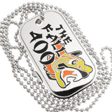Close up example of custom die cast dog tag with polished silver metal. Design has a dragon and text done is black, yellow and orange hard enamel colors. Example also shows the 30" necklace ball chain. 