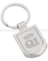 A polished silver keychain featuring a badge-shaped pendant engraved with the Ford logo and "Q1".