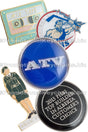 Group of Classic Raised Metal with Epoxy lapel pins showing different colors and shapes. Designs shown included a silver and blue pin with text ATV, another of a figure in uniform, and another in the design of a mixed tape.  