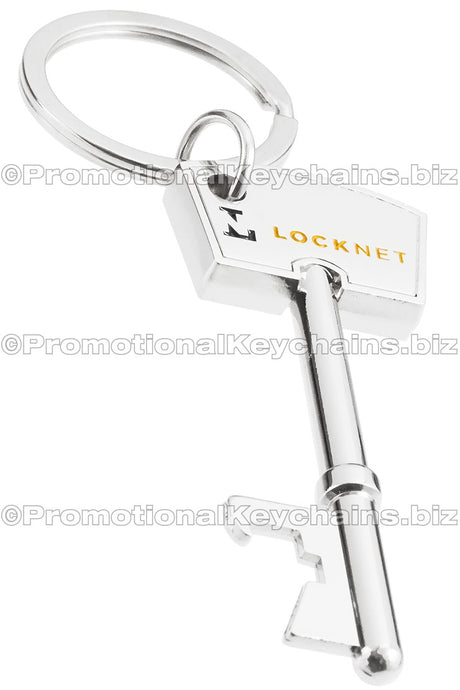 Polished silver nickel key shaped bottle opener. A black and yellow enamel logo at top of key. Key ring attached. 