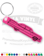 A pink vinyl keychain in the shape of a classic Cadillac car, with imprinted text and logo.